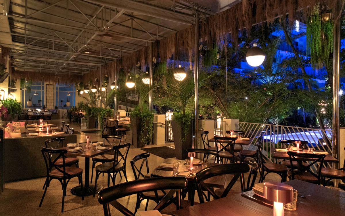 a restaurant dining area with tables and chairs